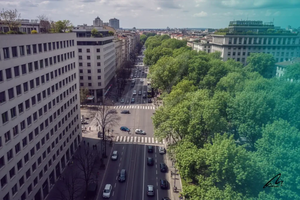 A thermal comparison of a concrete urban street versus a dense tree canopy street in Milan.